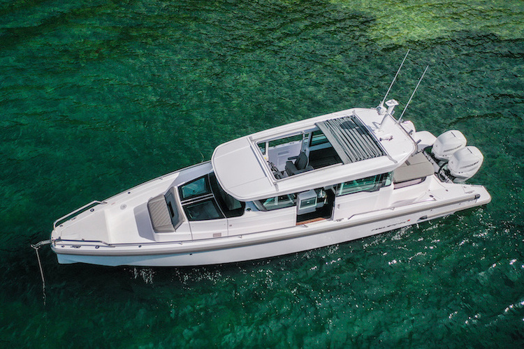 Cabin boat on green water 