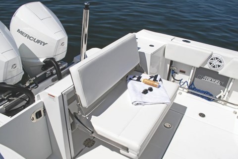 Close-up of the back interior of a power boat with the motor