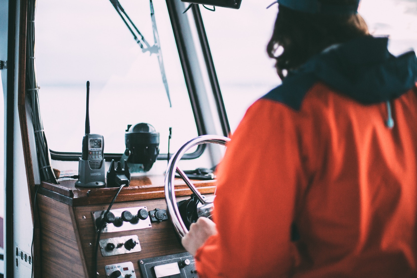 person driving a boat