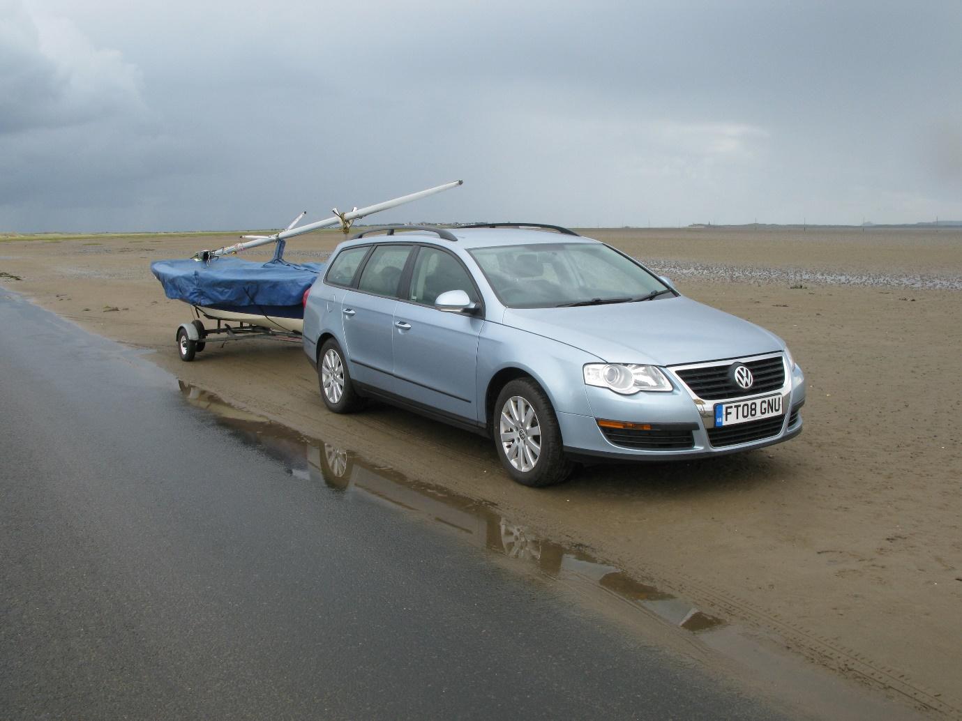 Simon's Wanderer dinghy being towed on the causeway